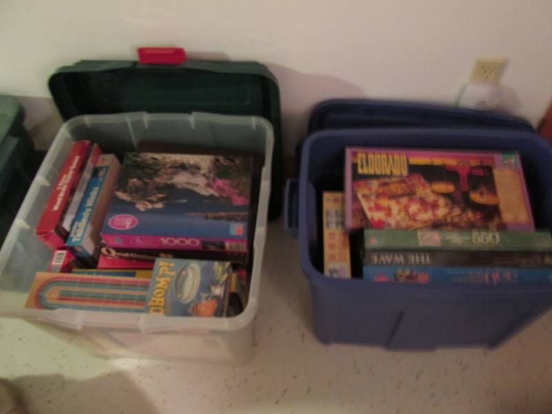 2 Covered Totes full of Puzzles...