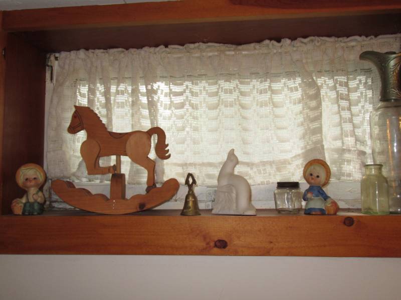 Vintage Collectibles on Shelves and...