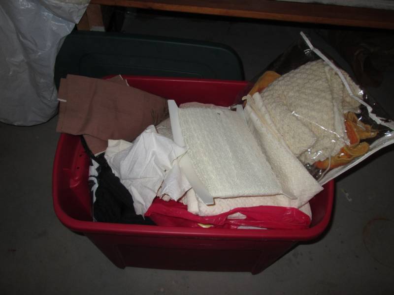 Covered tote full of Linens and Tab...