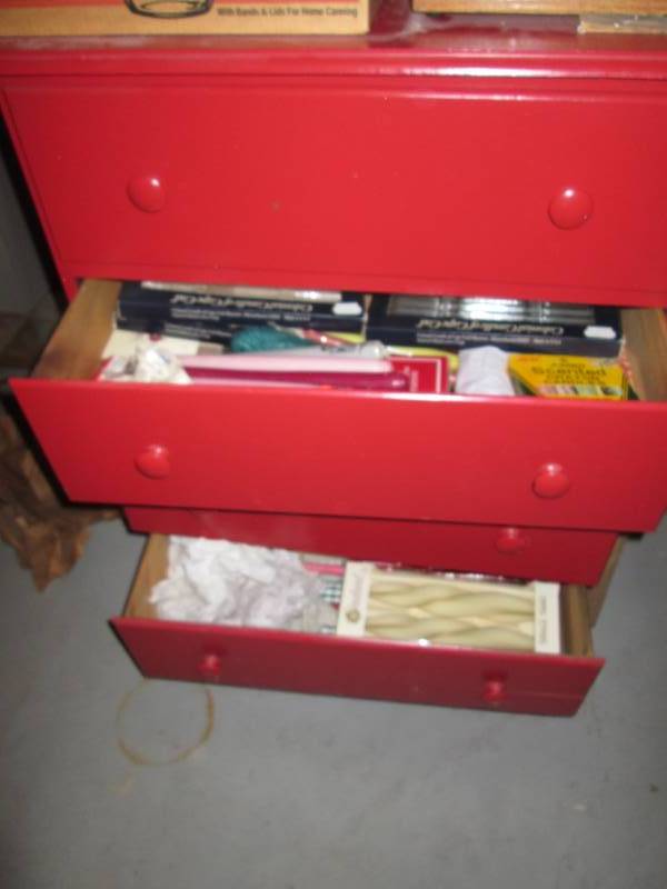 Red 4 Drawer Dresser full of Candle...