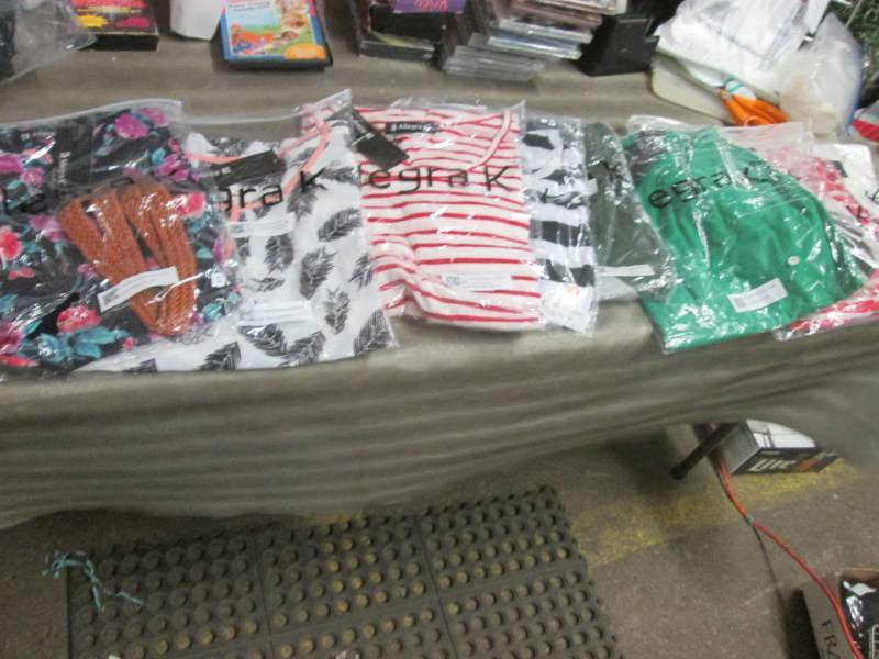 9 Assorted Sized Ladies Tops NWT...