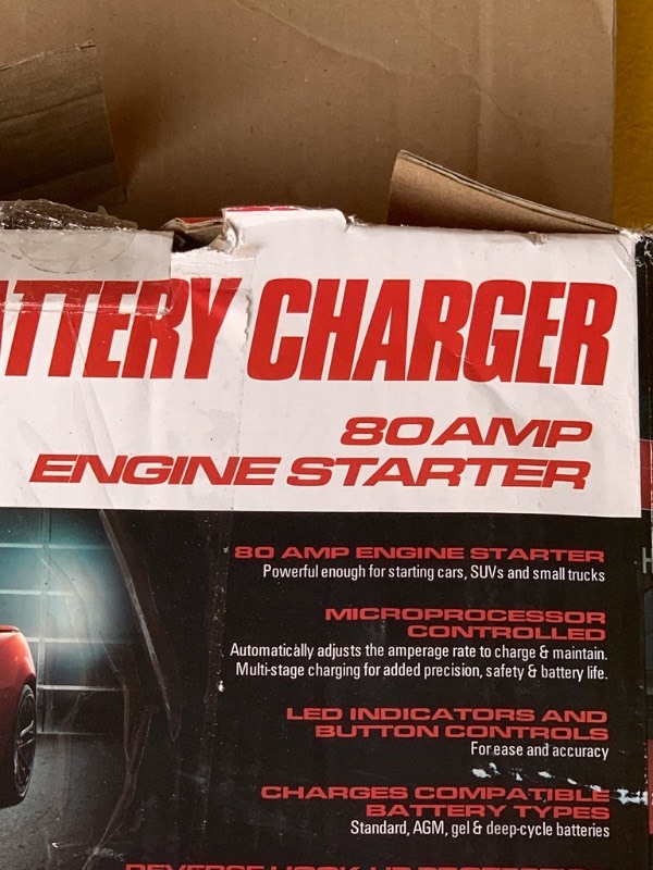 lot 7 image: Battery Extender Battery Charger Engine Starter