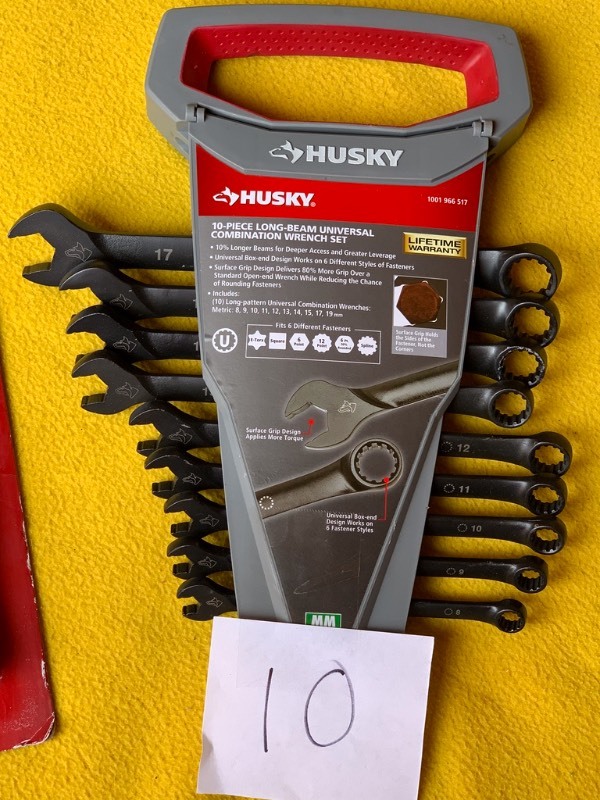 lot 10 image: Tool lot- Husky 10-piece Combo Wrench set, 3- piece Plier set