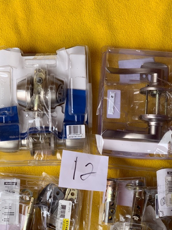 lot 12 image: Salvage Lot- 5 Door Knob sets