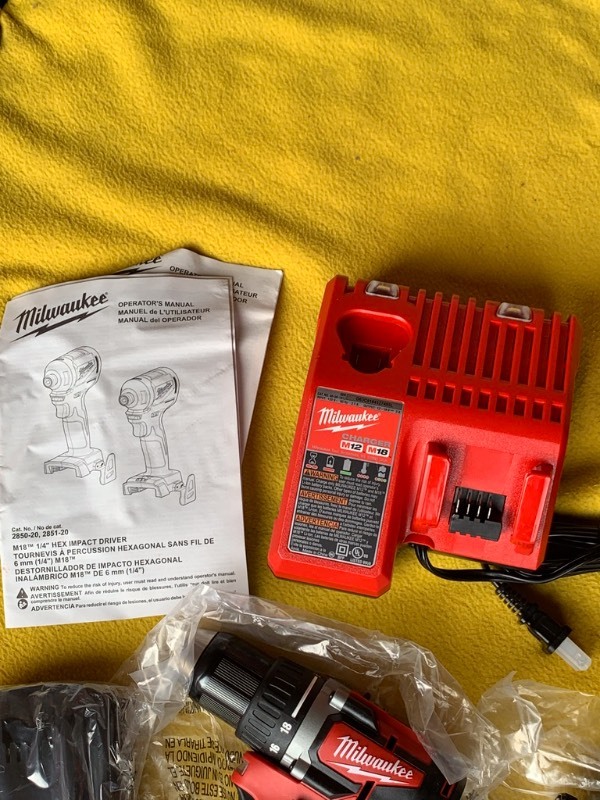 lot 63 image: Milwaukee M18 Brushless Impact Driver and Drill Kit w Batteries and Charger