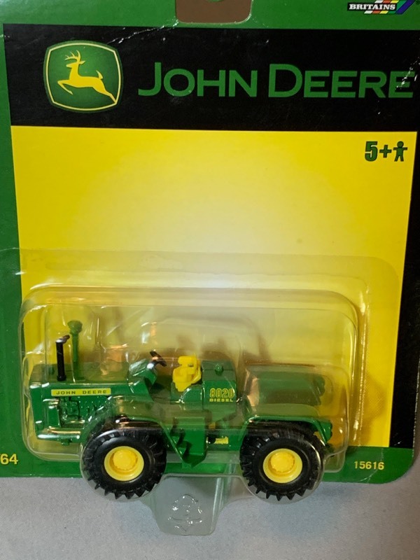 lot 82 image: Lot of 5 vintage John Deere ERTL Die Cast 164 Scale models new