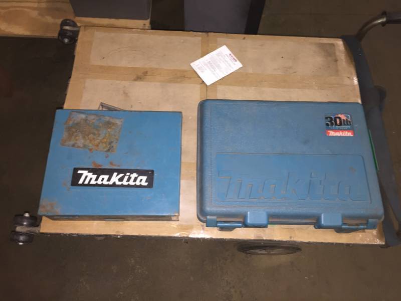 lot 92 image: Makita Drill 9.6V w charger & 2 batteries and another Makita Drill 9.6V wcharger & battery