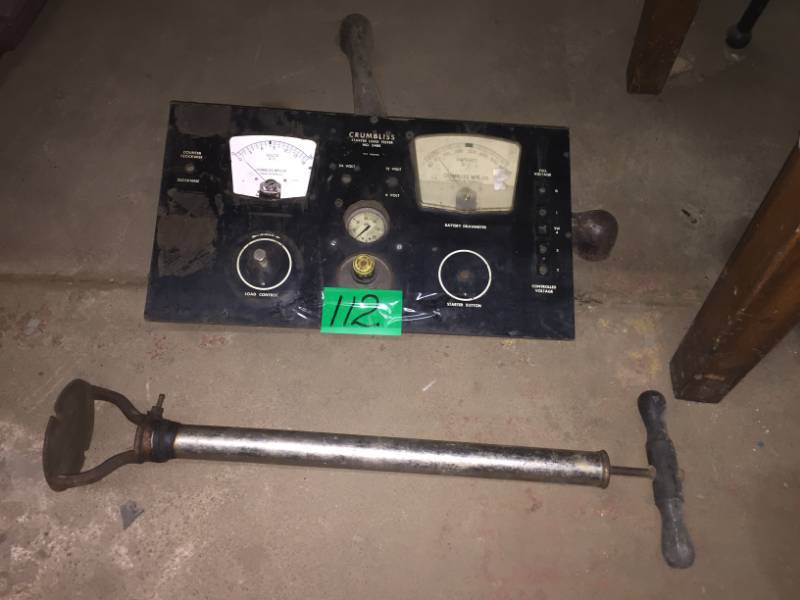 lot 112 image: Steampunk gauge panel, vintage bicycle pump, and heavy 3-leg base