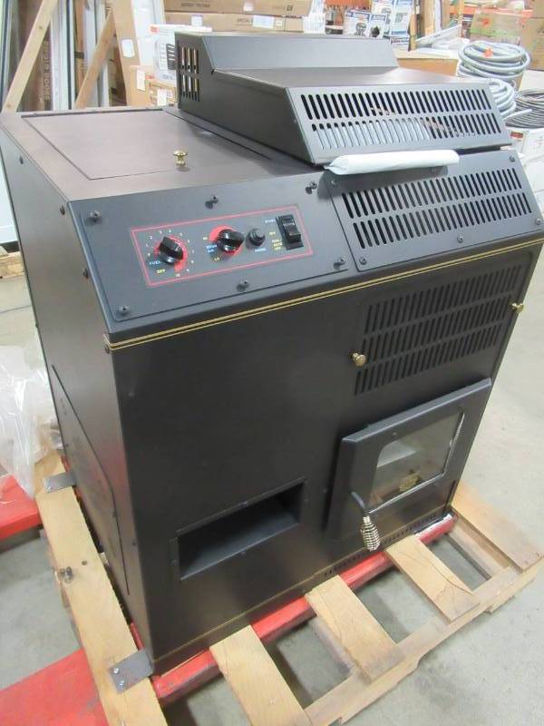 lot 15 image: AMAIZABLAZE CORN STOVE - MODEL 7100 - ADJUSTABLE BTU UP TO 72,000 BTUS - DIRECT VENT - MISSING HORIZONTAL VENT CAP - NEVER USED