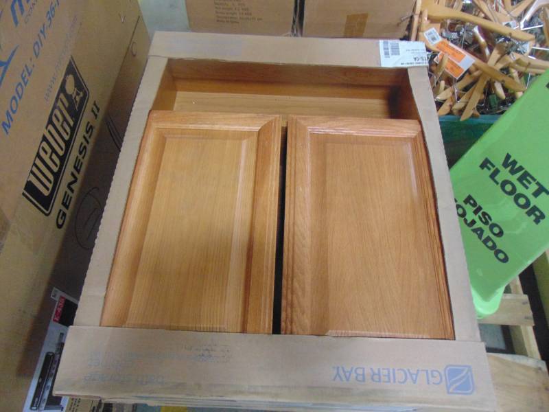 lot 449 image: Glacier Bay 23 in. W x 28 in. H x 6-12 in. D Bathroom Storage Wall Cabinet in Oak TTS-OA