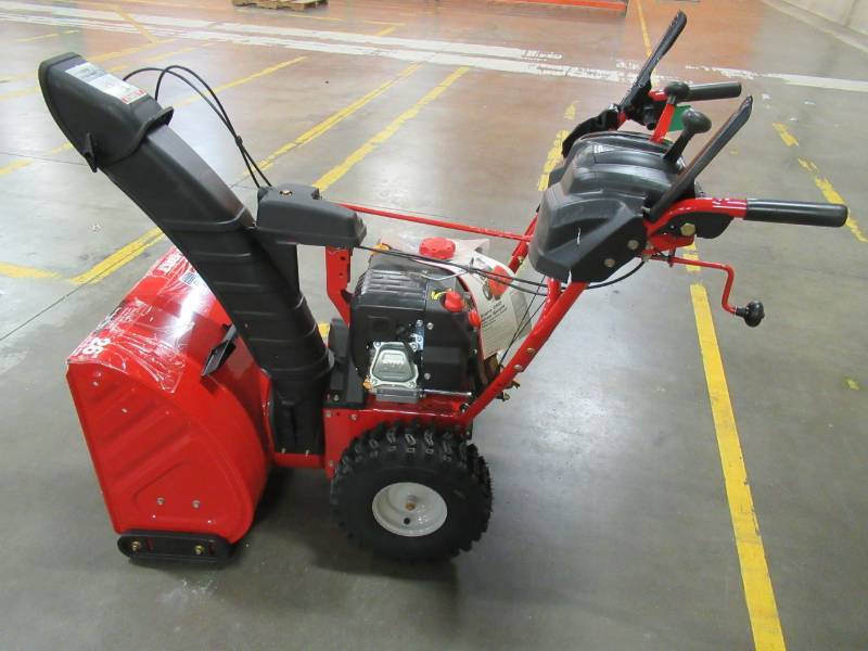 lot 10 image: Troy-Bilt 26 in. 243 cc 2-Stage Gas Snow Blower with Electric Start Self Propelled and 1-Hand Operation - Cracked Control Dash bent handle bars - NEVER RUN.