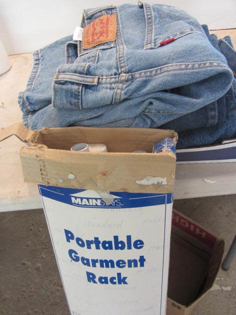 lot 92 image: Garment Rack & Mens Jeans