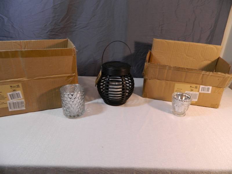 lot 225 image: 16 New Glass Candle Holders and New Solar Lantern
