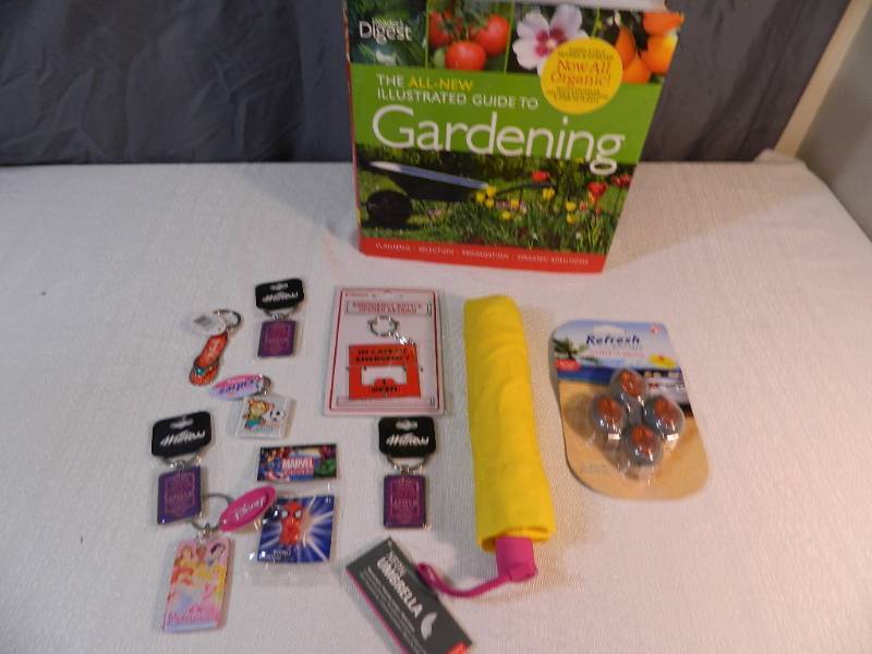 lot 252 image: New Gardening Book, Keychains, and More