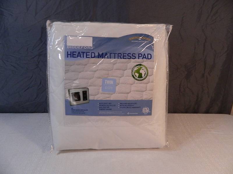 lot 24 image: New Twin Heated Mattress Pad