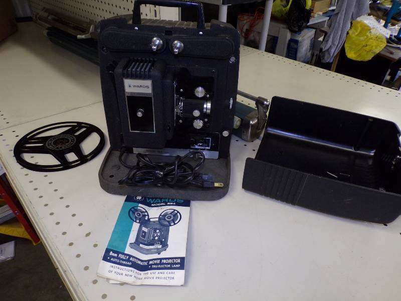 lot 89 image: Montgomery Wards Projector and Folding Aurora Portable Screen