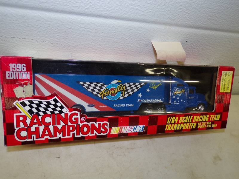 lot 11 image: Racing Champions Limited Edition Die Cast Metal Collector Replica The Family Chanel