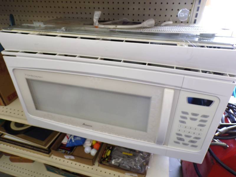 lot 28 image: Microwave over the oven Mount