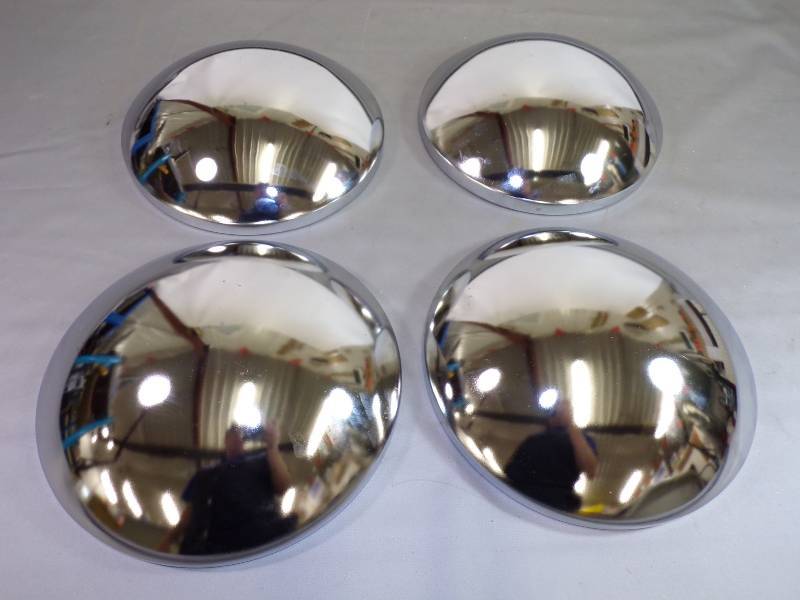 lot 47 image: Set of Baby Moon Hubcaps for 15 Wheels