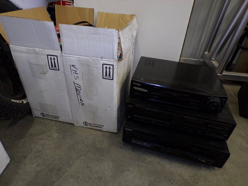 lot 145 image: VCR player-recorder - Scott AMFM receiver- Sony 5 disc changer- Sharp recorder - 2 boxes of VHS movies