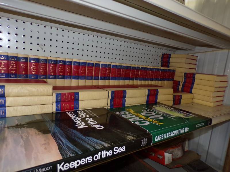 lot 153 image: Set of red & cream Zane Grey hardcover books