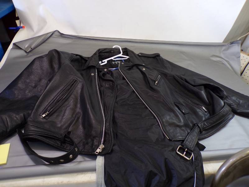 lot 108 image: Leather Jacket size 68 - 2 pair of Wind Pants 3XL