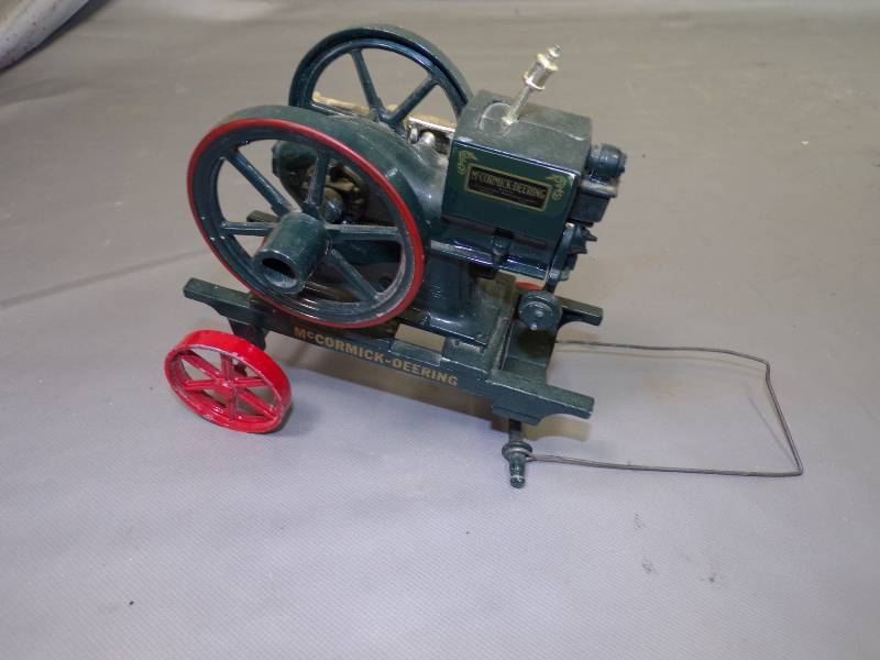 lot 110 image: Vintage McCormik-Deering Steam engine