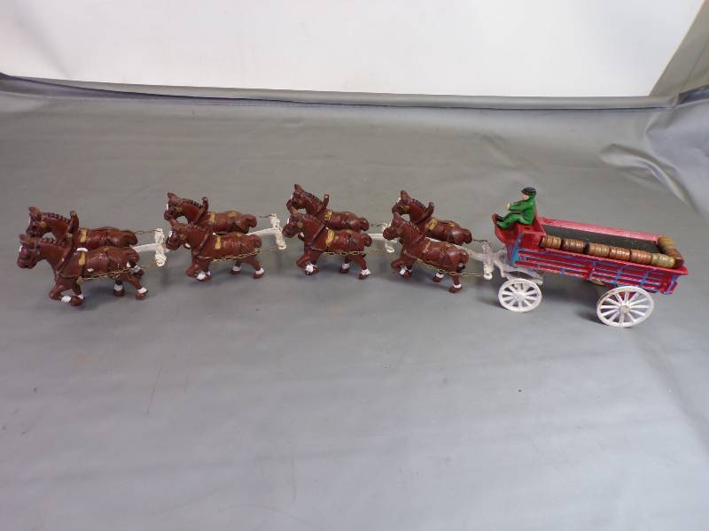 lot 111 image: Cast Iron Wagon with Driver and 8 Horses