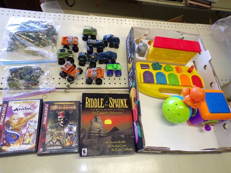 lot 201 image: 10 Toy Trucks, 2 Card games and computer game, Army Toys, and vintage baby toys