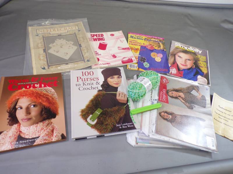lot 213 image: Sewing  Knitting  Crochet Book and patterns, yarn, and folding fan