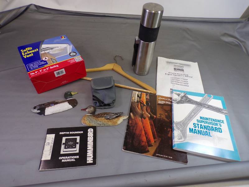 lot 215 image: Reinhart Gun Book, Maintenance Manuals, soffit Vent, Ducks and Thermos