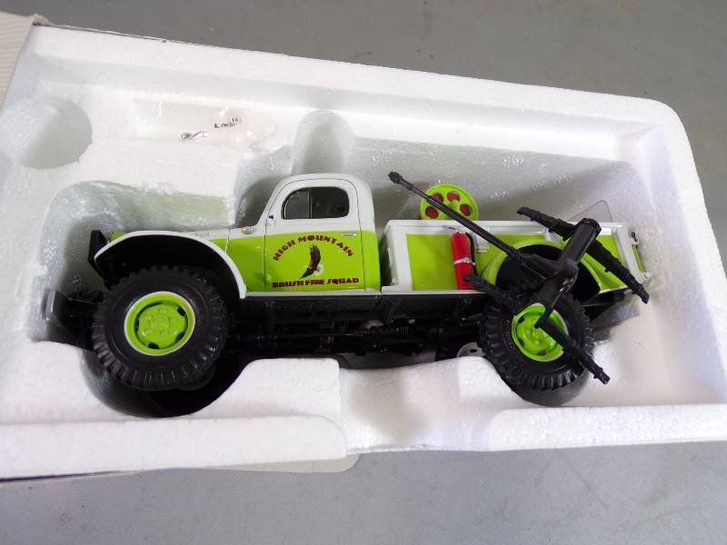 lot 240 image: Brush Fire Limited Edition Die Cast Metal Collector Replica needs repair