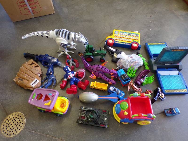 lot 255 image: Toy lot with Tractors, Electronic Battleship and more
