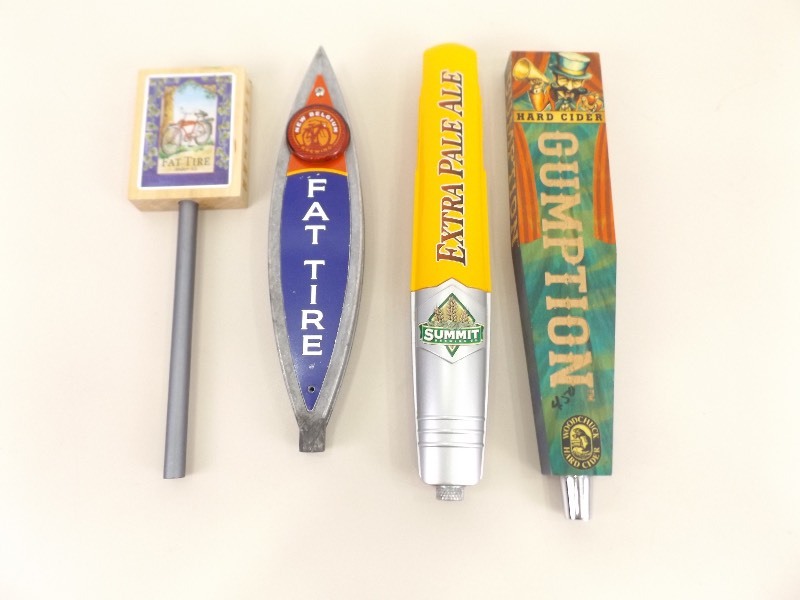 lot 24 image: Lot of 4 Summit, Fat Tire, and Gumption Beer Tap Handles