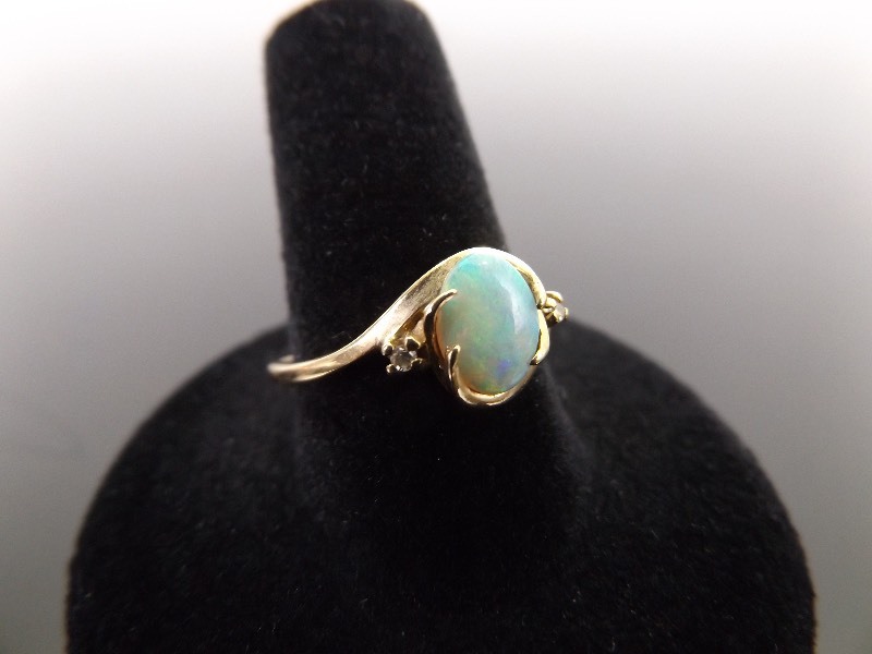 lot 56 image: 14k Yellow Gold Opal and Diamond Accented Ring Size 9