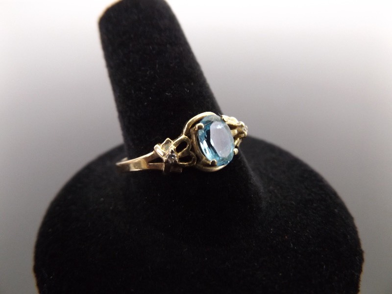 lot 57 image: 14k Yellow Gold Topaz and Diamond Accented Ring Size 10.25