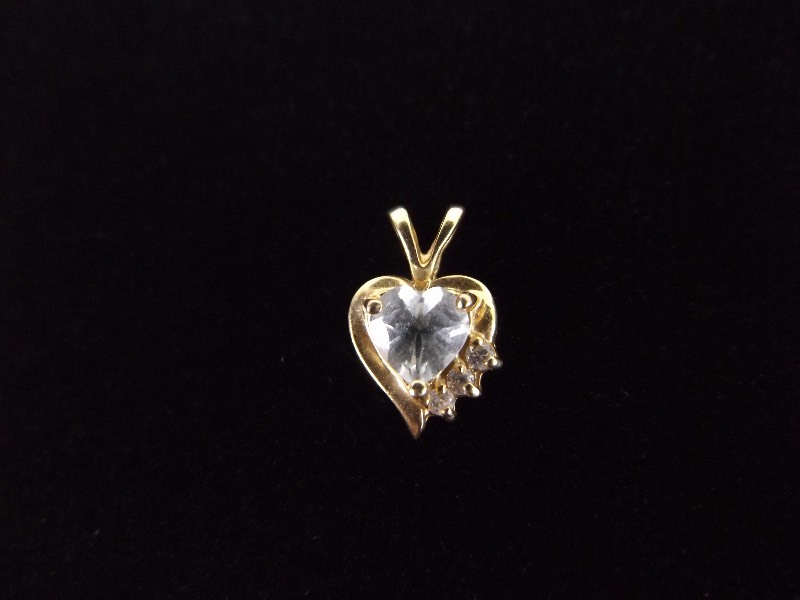lot 63 image: 10k Yellow Gold Crystal Heart Pendant