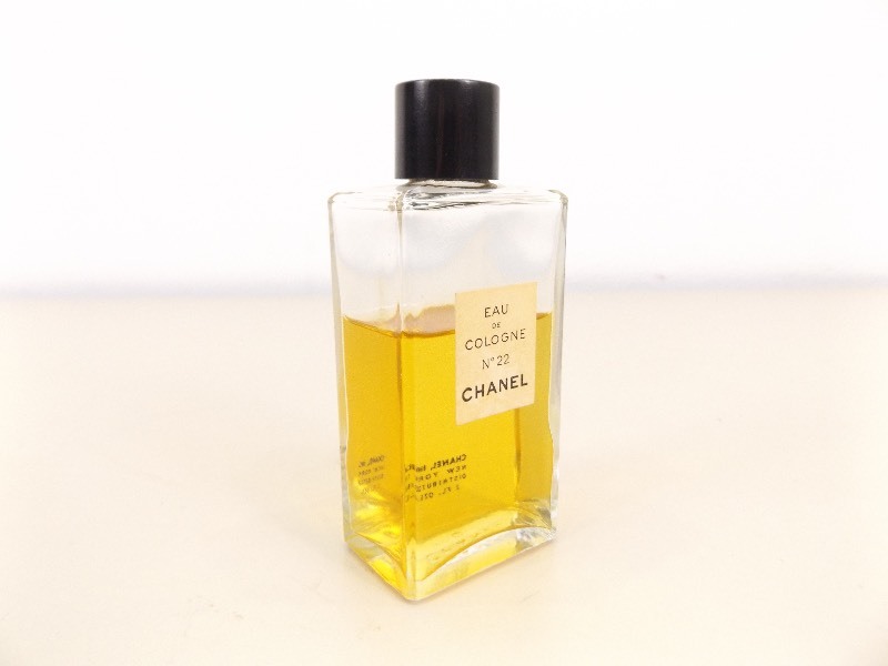 lot 86 image: 2 Ounce, 23 Full CHANEL No. 22 Perfume Bottle