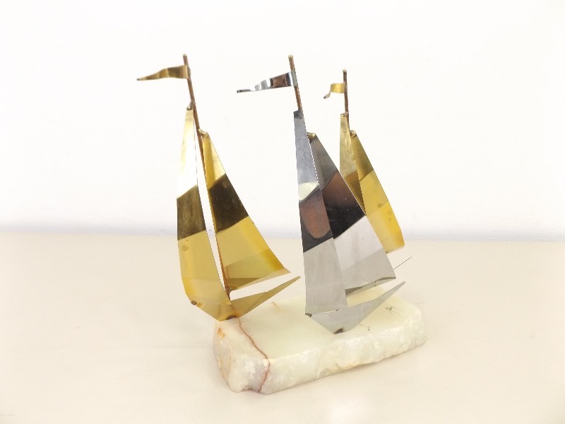 lot 88 image: Mid Century Curtis Jere Sailboat Sculpture on Marble base