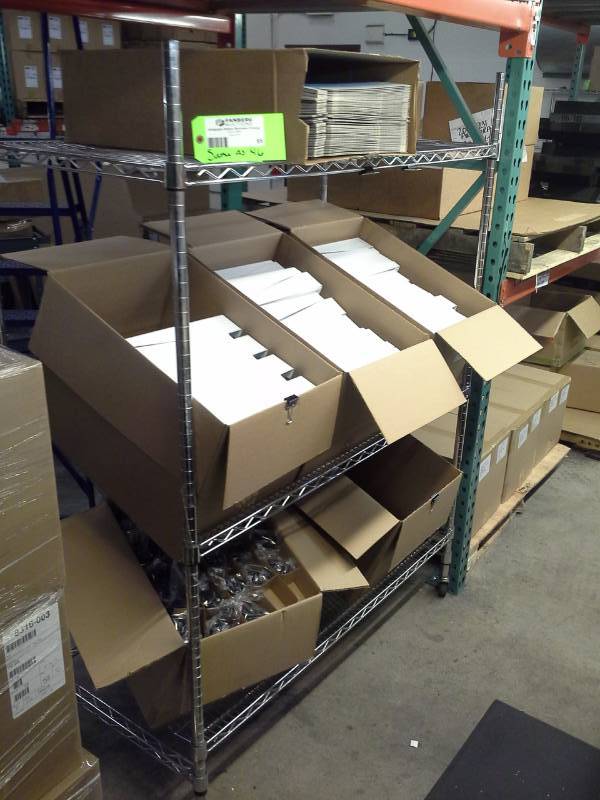 lot 55 image: Uline NSF Rolling Metal Wire Rack Shelving Unit with 2-Sloped Shelves, 2-Flat Shelves