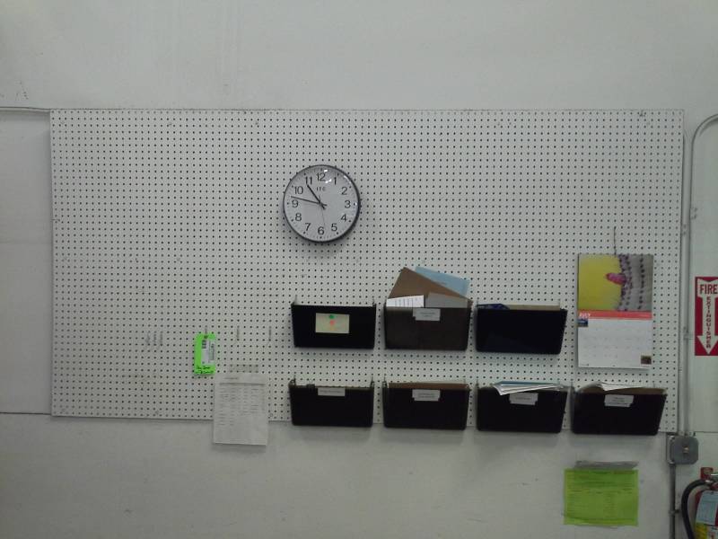 lot 63 image: Pegboard with Office Paper Organizers, Wall Clock