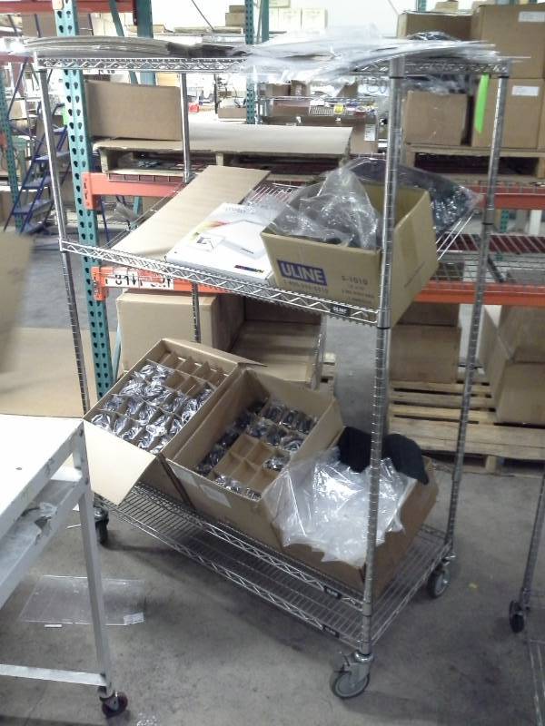 lot 68 image: Uline NSF Rolling Metal Wire Rack Shelving Unit with 2-Sloped Shelves, 2-Flat Shelves