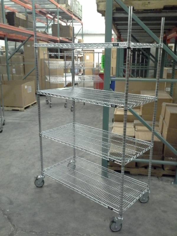 lot 120 image: Uline NSF Rolling Metal Wire Rack Shelving Unit with 4-Shelves