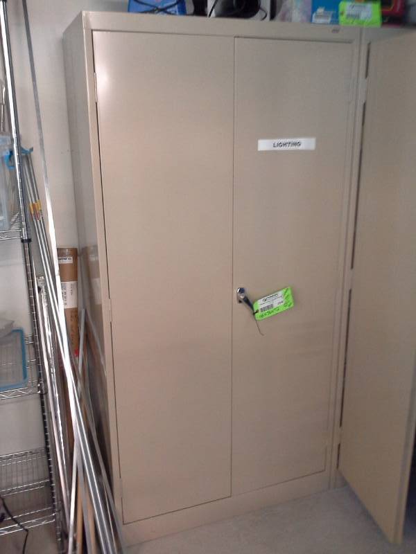 lot 2109 image: 2-Door Metal Utility Cabinet with Key