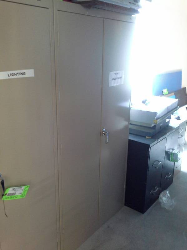 lot 2111 image: 2-Door Metal Utility Cabinet, Office Supplies, Drill Bits, Wood Glue, Wood Filler, and more