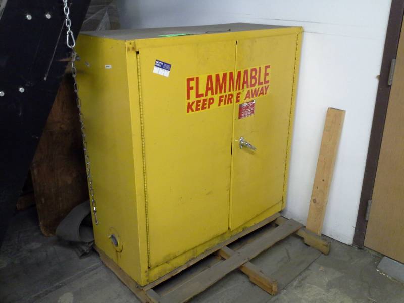 lot 2169 image: Flammable Keep Fire Away 2-Door Metal Shop Cabinet with 2-Shelves, Paint, Paint Trays, Spray Paint, And More