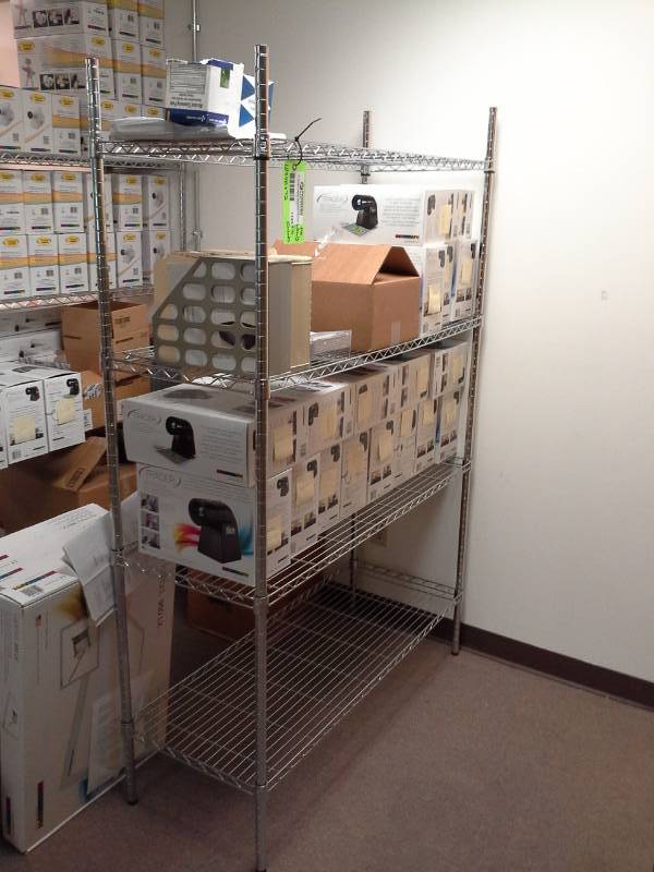 lot 1143 image: NSF Metal Wire Rack Shelving Unit with 4-Shelves