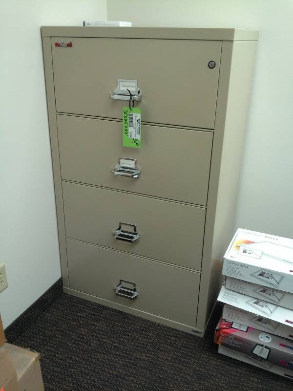 lot 1205 image: Fire King 4-Drawer Fireproof File Cabinet with Key
