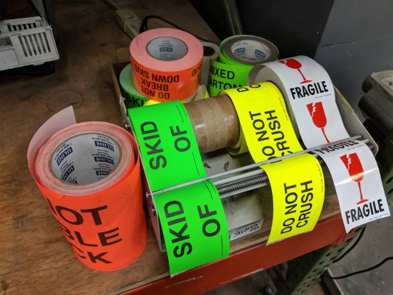 lot 284 image: Late Added Lot - Stickers and dispenser