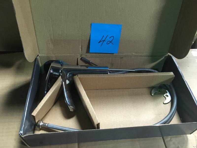 lot 42 image: Kiso Single Hole Single-Handle Low-Arc Bathroom Faucet in Chrome by Glacier Bay  in good condition